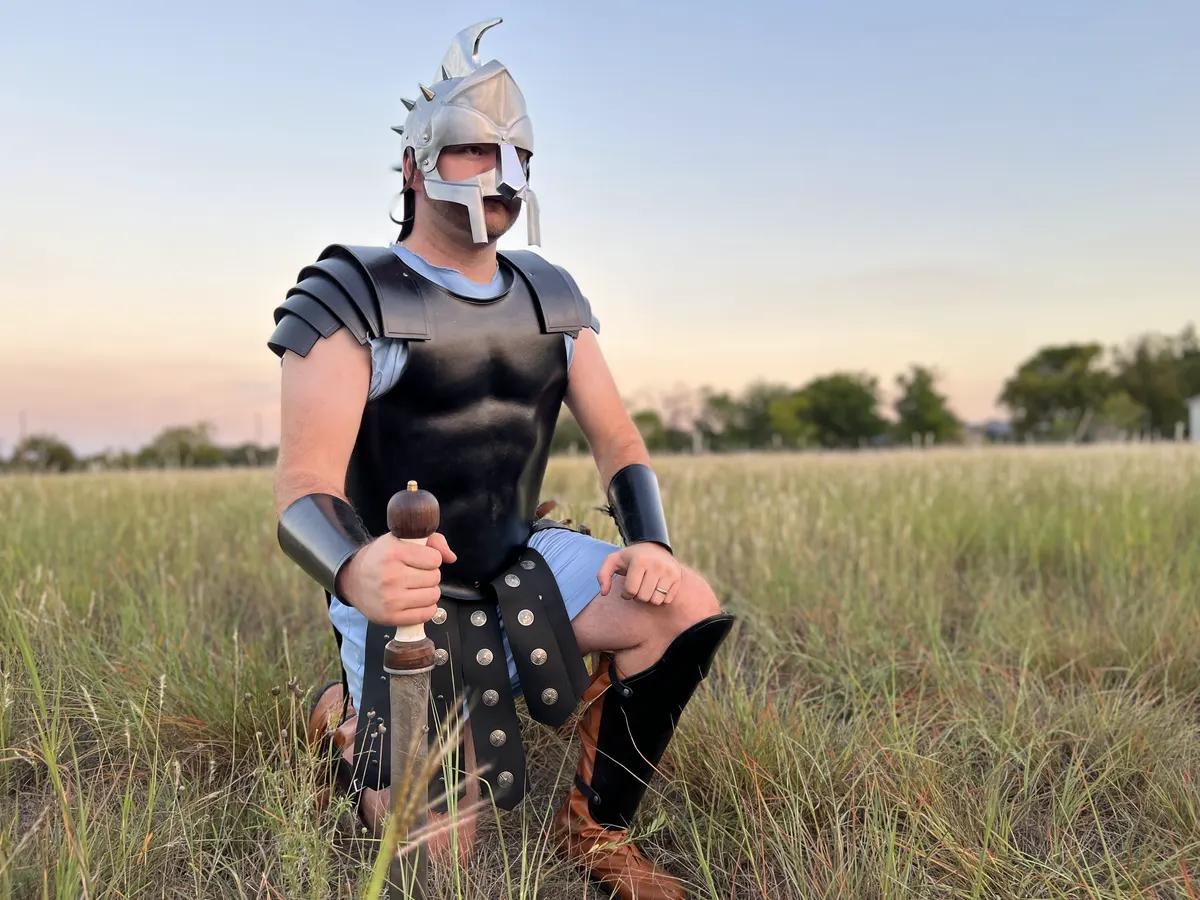 Sam, the maker behind Kulworks, wearing a full set of armor he designed and 3D-printed himself